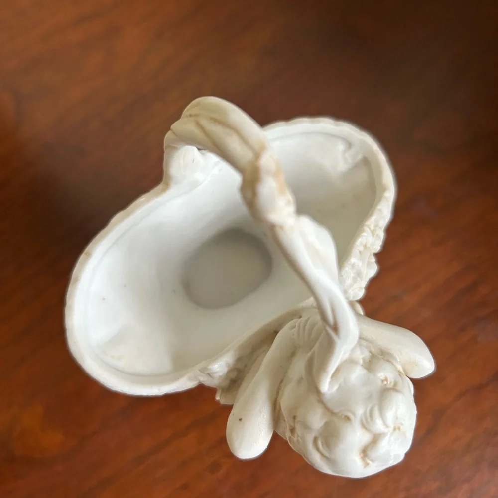 Vintage bisque porcelain angel basket